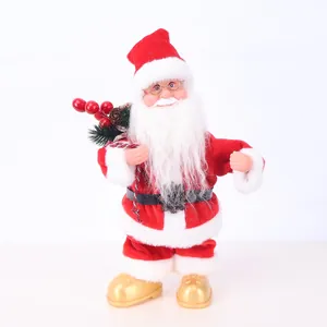 Detail view of a standing electric Santa Claus doll with red berries and golden shoes