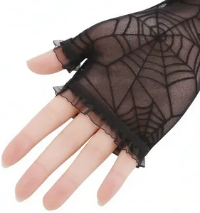 Detailed view of black lace fingerless gloves with spider web pattern and ruffled edges