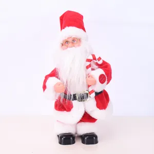 Detailed view of standing electric Santa Claus doll holding a candy cane with press button