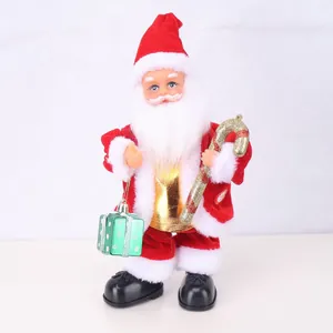 Detailed view of electric standing Santa Claus figurine with gift and candy cane