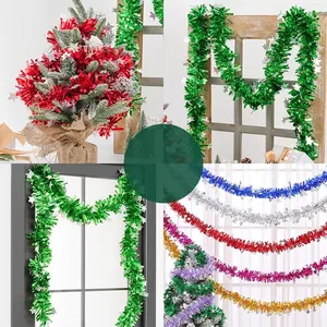 Multi-colored Christmas tinsel garlands with stars for tree and room decoration