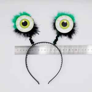 Serre-tête Halloween effrayant avec yeux verts et règle de mesure de détail.