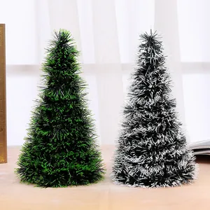 Mini tabletop bottle brush Christmas trees in green and snow-tipped black for holiday decor
