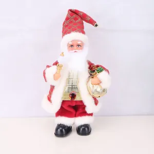 Close-up of standing electric Santa Claus figurine doll for Christmas window decor