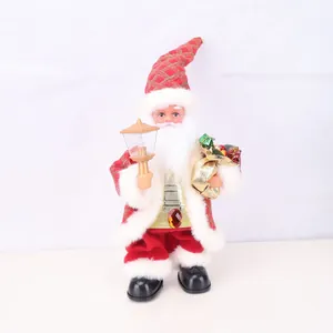 Detailed standing electric Santa Claus doll figurine holding a lantern and a golden gift bag