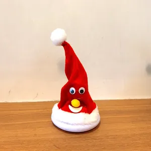 Detail of a 6-inch electric musical Christmas hat toy with googly eyes and red velvet.
