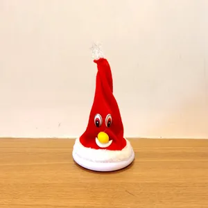 Electric red Christmas hat toy with cartoon face and top star decoration.