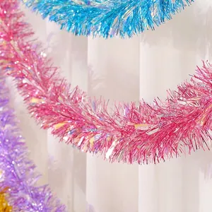 Iridescent Christmas tinsel garland with colorful light refraction effect