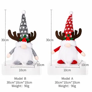 Pair of plush Christmas gnomes with reindeer antlers and dimensions displayed
