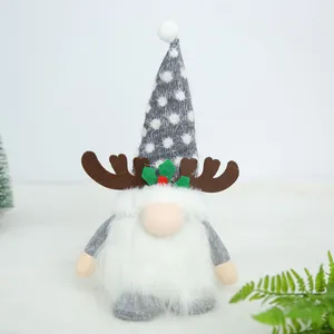 Detailed view of a Christmas gnome plush with grey knit hat and reindeer antlers