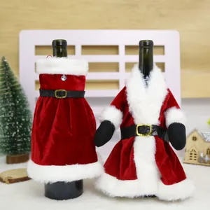Pair of festive Santa Claus costume wine bottle covers for Christmas table decor.