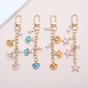 Porte-clés à la Mode Thème Marin Coquillage Étoile de Mer Or Émail Perle Artificielle Bijou de Sac Pendentif de Clé de Voiture Bijoux de Plage d'Été Pour Femmes