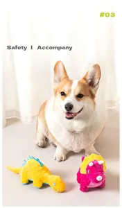 Corgi dog playing with yellow and pink dinosaur plush pet toys on a light carpet