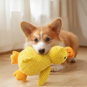 Interactive plush squeaky yellow duck dog toy designed for durable chewing and play.