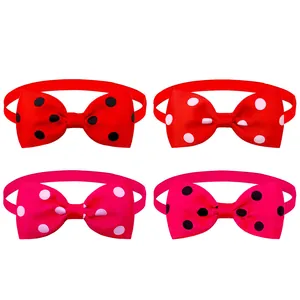 A detailed set of four polka dot pet bow tie collars in vibrant red and pink colors