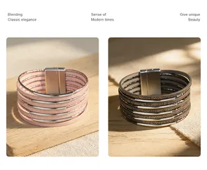 Detailaufnahme von mehrlagigen PU-Lederarmbändern mit silbernen Magnetverschlüssen
