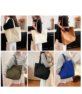 Close-up view of minimalist canvas tote shopping bags in multiple colors on models