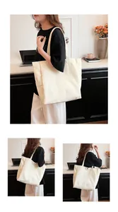 Versatile large off-white canvas tote bag for women in a modern office lifestyle