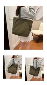 Multi-angle view of an olive green canvas tote bag on a model for lifestyle styling