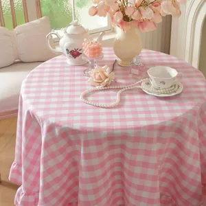 Pink and white gingham round tablecloth with elegant ruffled edges for home dining