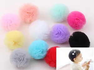 Close-up of colorful 2.5cm DIY mesh balls for handmade baby hair bows and headbands