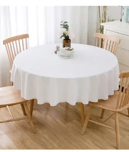 Minimalistische weiße runde Tischdecke mit elegantem Spitzenrand für den Esstisch