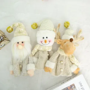 Detailed view of three plush Christmas wine bottle covers featuring Santa snowman and reindeer