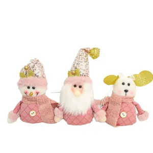 Set of three pink plush Christmas figurines with gold sequin hats and button details for decor