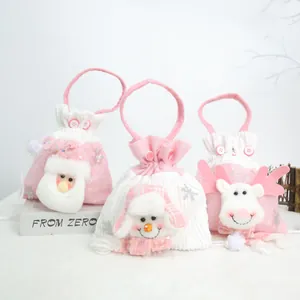 Lot de trois sacs-cadeaux de Noël en peluche rose avec personnages 3D père Noël et cerf