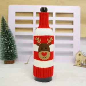 Red and white striped knitted wine bottle cover with a cute reindeer felt appliqué detail