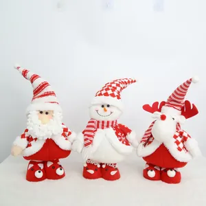 Set of three festive Christmas plush dolls featuring Santa, snowman, and reindeer.