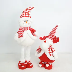 Christmas plush snowman and reindeer dolls featuring festive red and white striped patterns