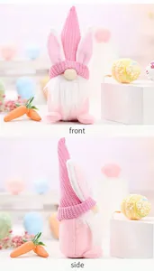 Front and side views of a pink Easter gnome plush with bunny ears and white beard