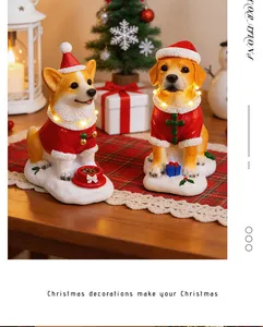 Detailed view of glowing resin Christmas dog figurines on a festive decorated table