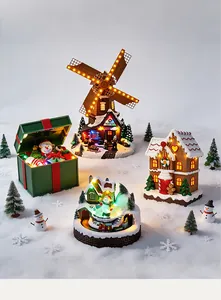 Detailed view of luminous Christmas resin ornaments with warm LED lighting and festive designs
