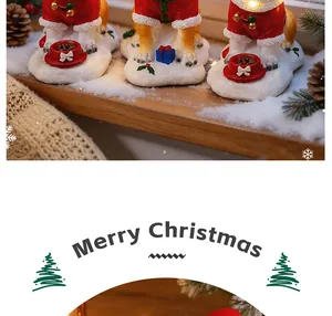 Detail view of glowing Corgi Christmas ornaments wearing Santa suits on snowy shelf