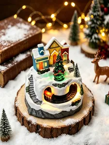 Detailed close-up view of a miniature Christmas village with a rotating train and LED lights