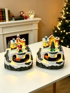 Detailed view of glowing Christmas snow village music box with moving miniature train.
