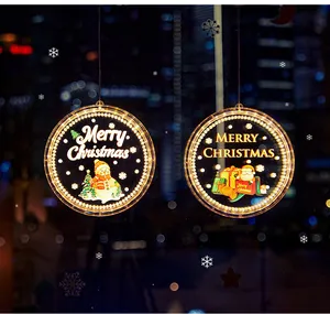 Detailed view of LED Christmas hanging ornaments with glowing Merry Christmas designs