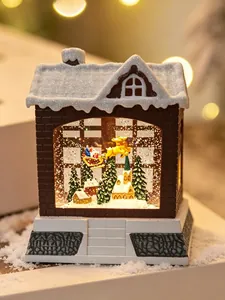 Detailansicht einer Weihnachts-Schneelaterne mit Weihnachtsmann, Rentieren und LED-Licht