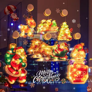 Festive LED Christmas suction cup window lights featuring Santa and Reindeer designs