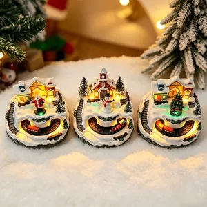 Festive LED Christmas snow village scene set with revolving miniature train and figures