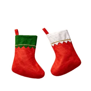 Classic red felt Christmas stockings set with festive green and white tops decoration