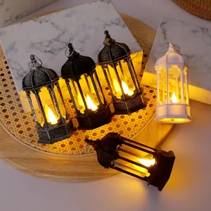 Set of vintage decorative hexagonal LED lanterns in multiple finishes with warm glowing light