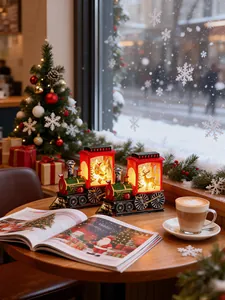 Detailed view of LED Christmas train lanterns featuring Santa and reindeer silhouettes in a cozy setting