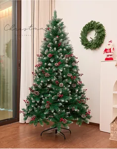 Premium artificial Christmas tree decorated with pine cones and red berries in a home living room.