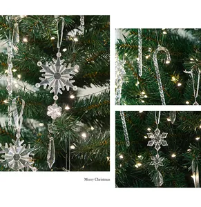 Macro view of transparent acrylic snowflake and icicle ornaments hanging on a Christmas tree