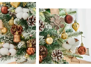 Detailed macro view of snow-flocked Christmas tree with gold and copper ornaments.