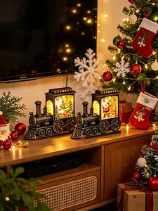 Close-up of vintage LED Christmas train lanterns on a wooden console with festive decor