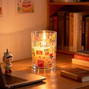 Cozy warm LED birthday candle light in glass jar featuring colorful Happy Birthday pattern